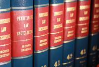 Thick volumes of the Pennsylvania Law Encyclopedia fill a shelf in the law library